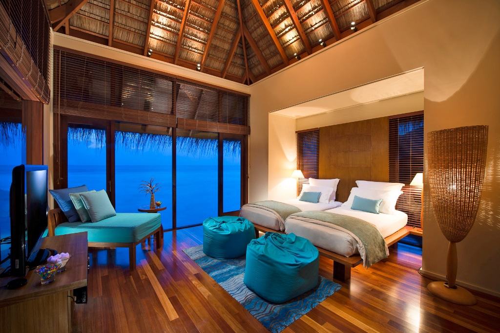 Conrad Maldives family water villa interior